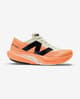 Scarpe New Balance FuelCell Rebel v4 arancione nero donna