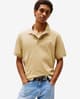 Polo Tommy Jeans Regular Linear manga corta beige