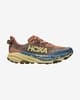 HOKA Speedgoat 6 sneakers brun gul blå