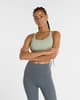 Sujetador New Balance Essential Train verde claro mujer