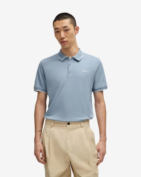 Polo HUGO à manches courtes bleu à contraste de couleur