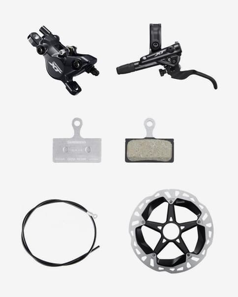 Freno de disco hidráulico Shimano XT M8100 delantero + Disco Center Lock