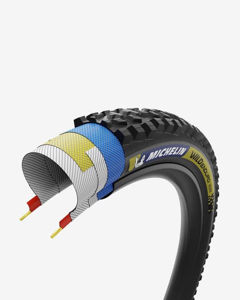 Cubierta trasera Michelin Wild Enduro 29x2.40 Racing Line Tubeless Ready gris negro