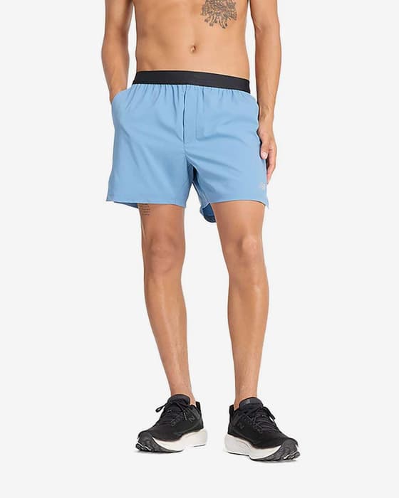 Pantalón corto New Balance AC Lined 5 inch azul claro