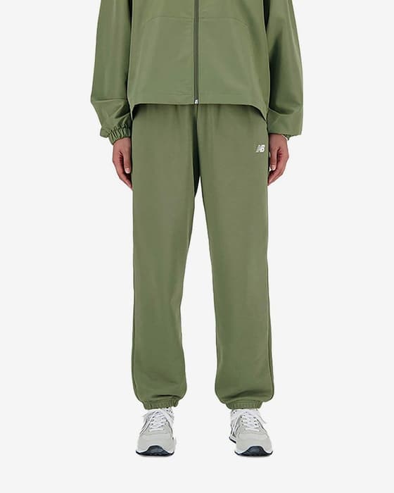 Pantalón largo New Balance Sport Essentials French Terry Jogger verde pálido mujer