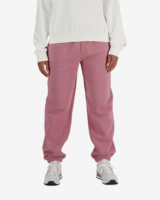 Pantalón largo New Balance Iconic Collegiate Jogger rosa mate